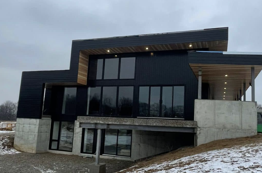 Modern black custom home built by Black Onyx Construction in Elgin County, Ontario